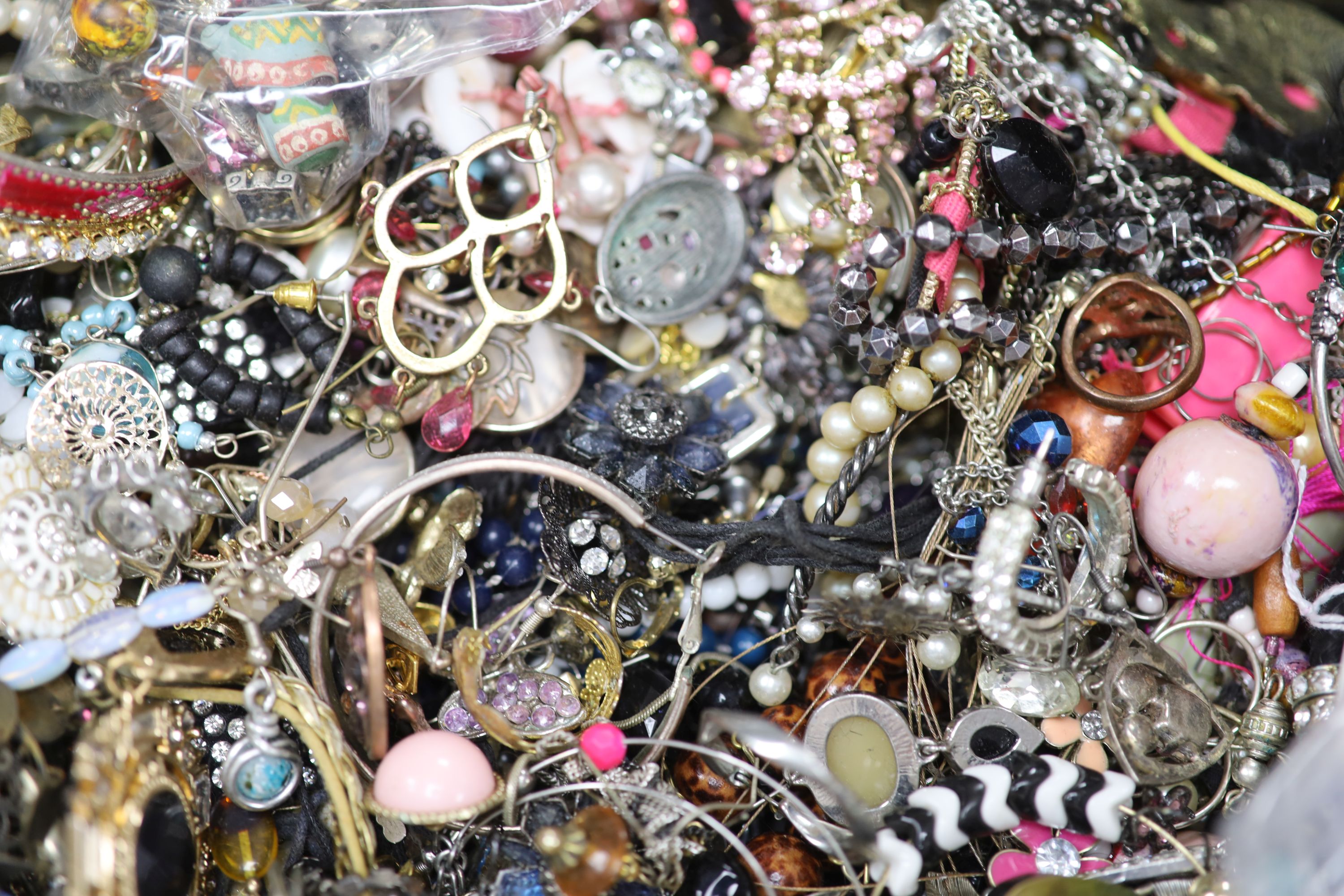 A large quantity of assorted costume jewellery.